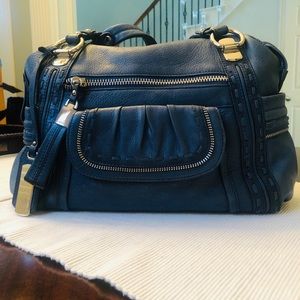 B. Makowsky purse in beautiful, rich blue pebbled leather